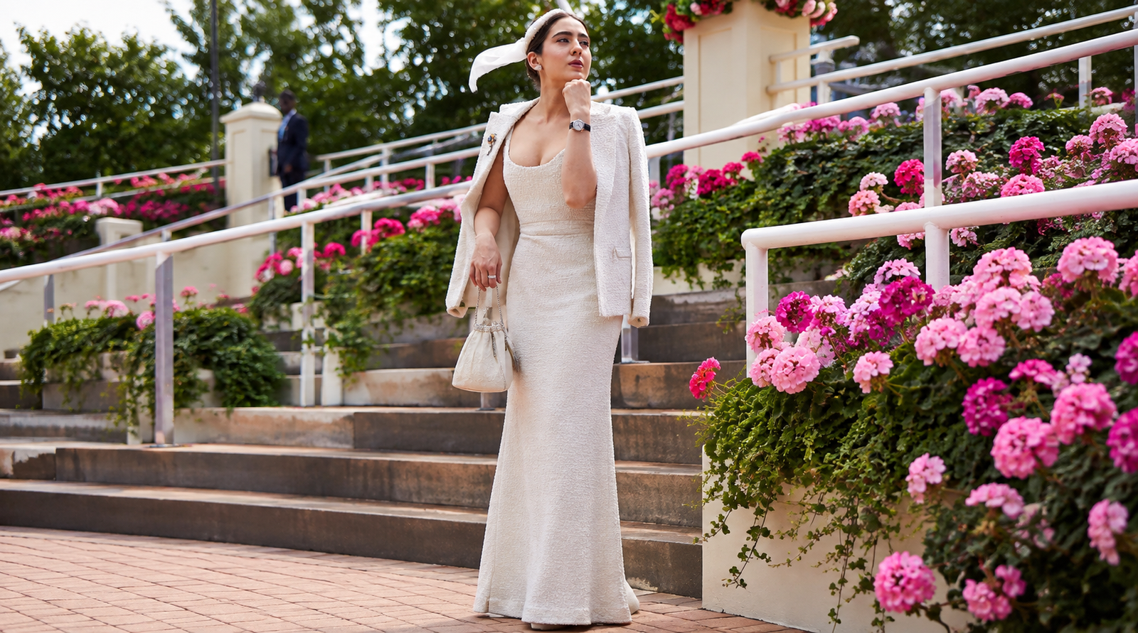 Sara Ali Khan র Royal Ascot লুক, Ivory টুইডে যেন এক রাজকীয় যুগের গল্প Sara Ali Khan Royal Ascot এ ivory টুইড আউটফিট ও headscarf পরে রেলিং এ হেলান দিয়ে দাঁড়িয়ে