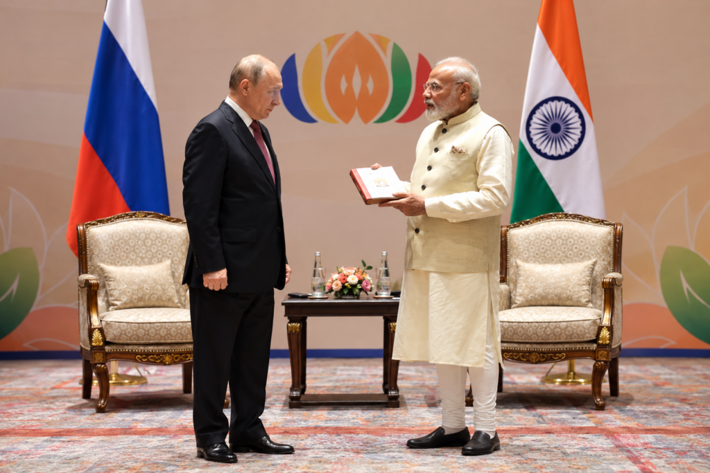 BRICS থেকে ভারতের লাভ কতটা? চিদম্বরমের প্রশ্ন,সম্মেলনের কূটনৈতিক গুরুত্ব বোঝালেন শশী থারুর প্রধানমন্ত্রী নরেন্দ্র মোদী রুশ প্রেসিডেন্ট ভ্লাদিমির পুতিনকে একটি বই উপহার দিচ্ছেন, BRICS সম্মেলনের আনুষ্ঠানিক পরিবেশে দুই রাষ্ট্রনেতার সাক্ষাৎ।